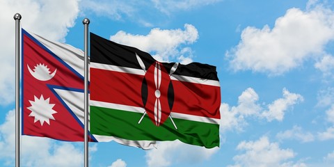 Nepal and Kenya flag waving in the wind against white cloudy blue sky together. Diplomacy concept, international relations.