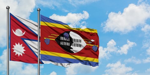 Nepal and Swaziland flag waving in the wind against white cloudy blue sky together. Diplomacy concept, international relations.