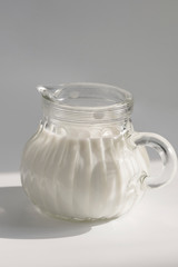 little Jar of milk for tea and bubble milk tea isolated on white
