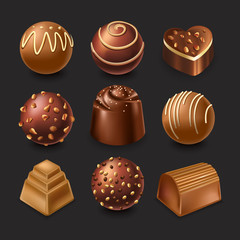 Assorted chocolate candies with different fillings and shapes