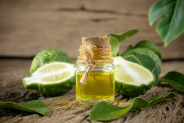 fresh bergamot fruit, Kaffir Lime, Citrus bergamia with leaf on wooden table. Bergamot citrus fruit essential oil or virgin cold pressed oil natural.organic cosmetic concept