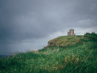 O'Brian's Tower near Cliffs of Moher in moody weather 