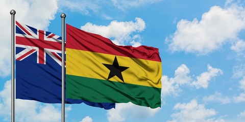 New Zealand and Ghana flag waving in the wind against white cloudy blue sky together. Diplomacy concept, international relations.