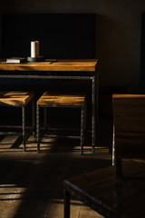 The interior of the cafe in dark colors.