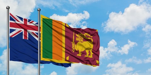 New Zealand and Sri Lanka flag waving in the wind against white cloudy blue sky together. Diplomacy concept, international relations.