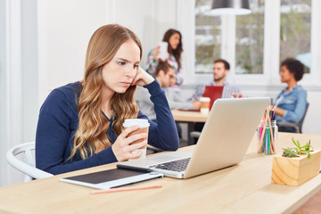 Young woman reflects on a problem