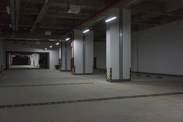 Dim modern underground parking space view background