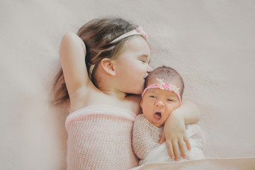 the concept of a healthy lifestyle, the protection of children, shopping - a child with a newborn...