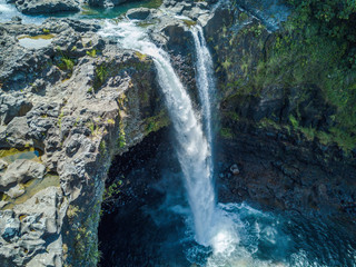 Aerial drone shot view of rainbow fall on big island national park in Hawaii 