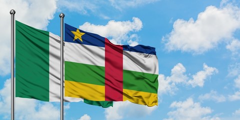 Nigeria and Central African Republic flag waving in the wind against white cloudy blue sky together. Diplomacy concept, international relations.
