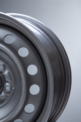 part of Steel wheel rim on grey background