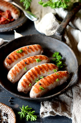 Homemade sausages from turkey (chicken) fried in a frying pan