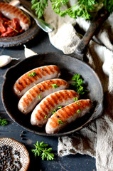 Homemade sausages from turkey (chicken) fried in a frying pan