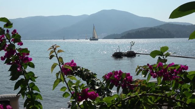 Knight island, Fethiye, Turkey - 30th of October 2019: 4K Beautiful scenery from island on the Fethiye gulf and passing yaght