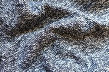 Draped blue grey melange woolen fabric from above