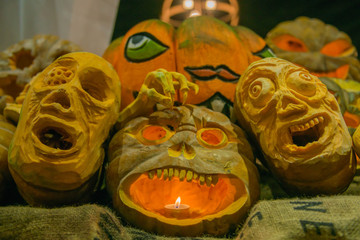 Halloween pumpkin head jack lantern monster with scary evil faces spooky holiday (color toned image)