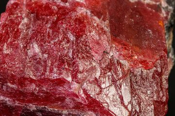 Obraz premium macro mineral Rhodonite stone on a black background