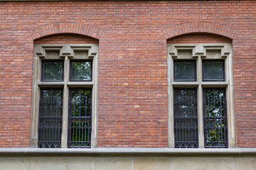 Fototapeta na wymiar Two Windows on Brick Wall Background
