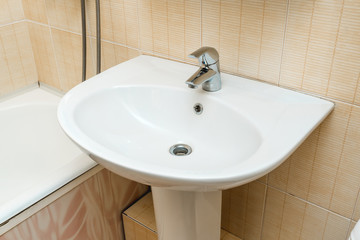 The photo of a sink in a bathroom