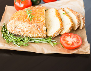 Fototapeta na wymiar Ciabatta bread. Cheesy Corn Bread and Vegetables. Healthy food