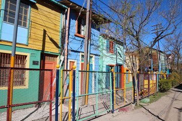 Fototapeta na wymiar Stroll in a colorful street in the La Boca district of Buenos Aires