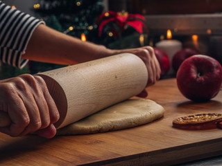 Roll out the cookies dough with a rolling pin. Home Pastry preparation on Christmas time. traditional Christmas cookies with cinnamon and spice 3