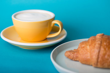 yellow cup on a blue background