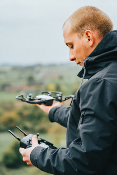 man flying with drone