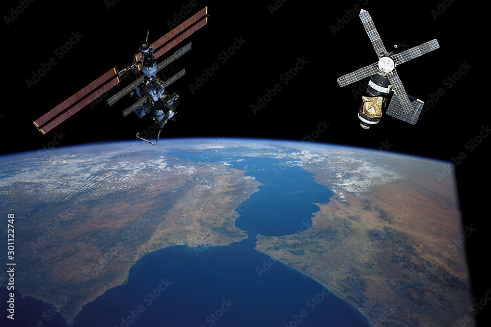 Canvas Prints space station. different spaceships above the earth. the elements of this image furnished by nasa.