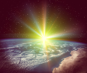 Sunrise on the planet earth. The elements of this image furnished by NASA.