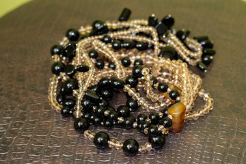 necklace of black stone and crystals