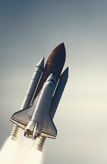 Rocket launch into dramatic sky. The elements of this image furnished by NASA.