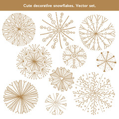 Cute gold decorative snowflakes. Vector set.