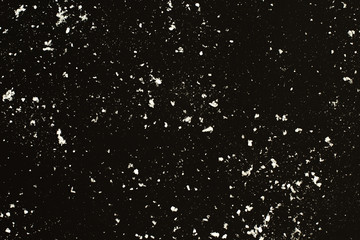 Falling snow on black background. Snowstorm texture.