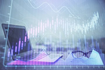 Forex Chart hologram on table with computer background. Double exposure. Concept of financial markets.