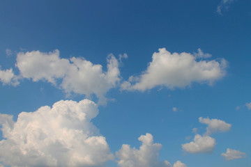 Blue sky with white clouds.
