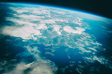 Earth, galaxy and stars.  The elements of this image furnished b