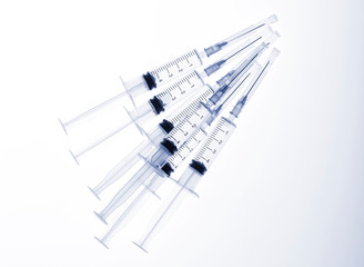 Syringe on white background with copy space