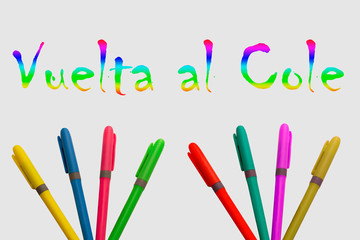 Colored markers on a white background, accompanied by the words back to school and with a fun design