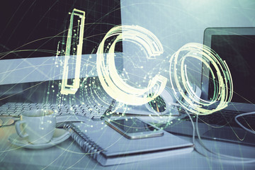 Multi exposure of blockchain theme hologram and table with computer background. Concept of bitcoin crypto currency.