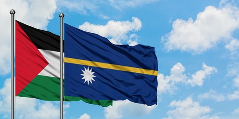 Palestine and Nauru flag waving in the wind against white cloudy blue sky together. Diplomacy concept, international relations.