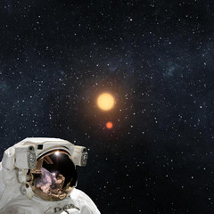 Astronaut and deep space. Science theme. Galaxies and stars. The elements of this image furnished...