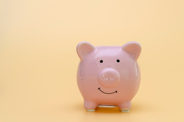 Piggy Bank on yellow background.,money saving financial concept.
