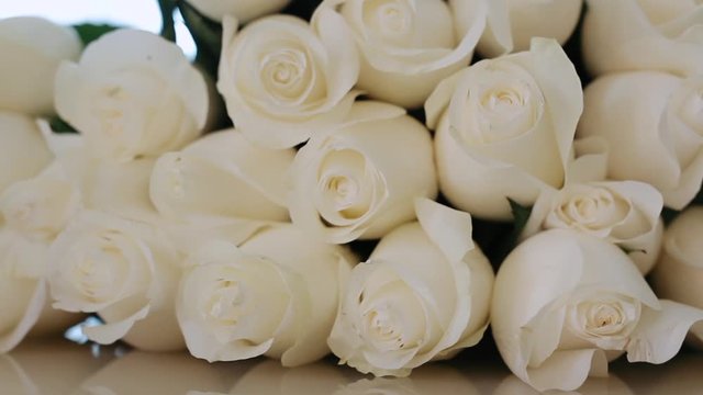 a large bouquet of white roses