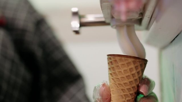 Ice cream is poured from the appliance