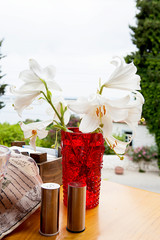 Flowers with water in a restaurant in the afternoon.