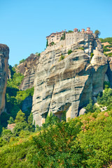 Monastery on the top of tall cliff in Meteora