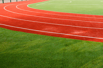 Obraz premium Close up background of football field and track