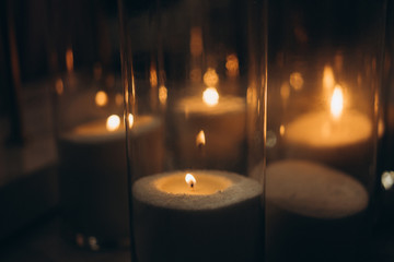  burning glass candles at night, wedding decor