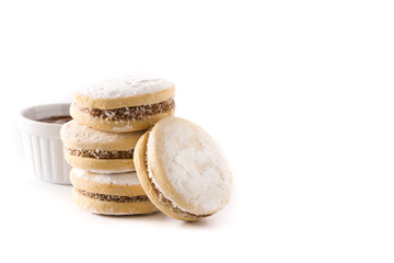 Traditional Argentinian alfajores with dulce de leche and sugar isolated. Copy space	
